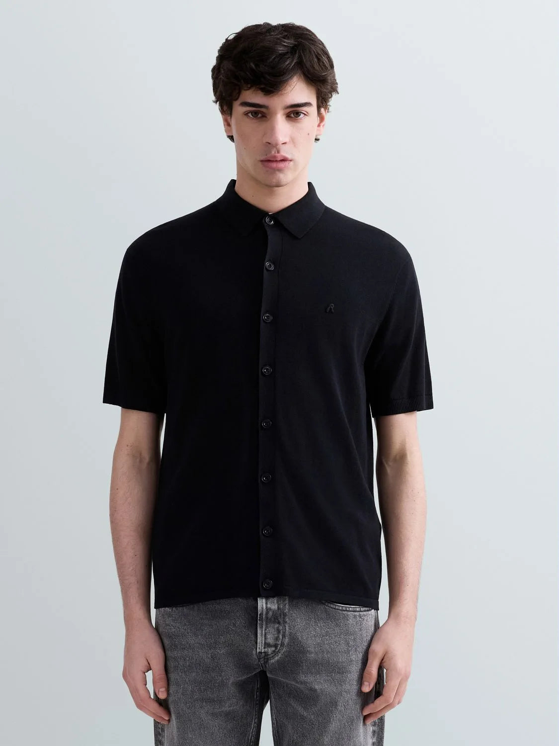 Suéter estilo camisa de manga corta