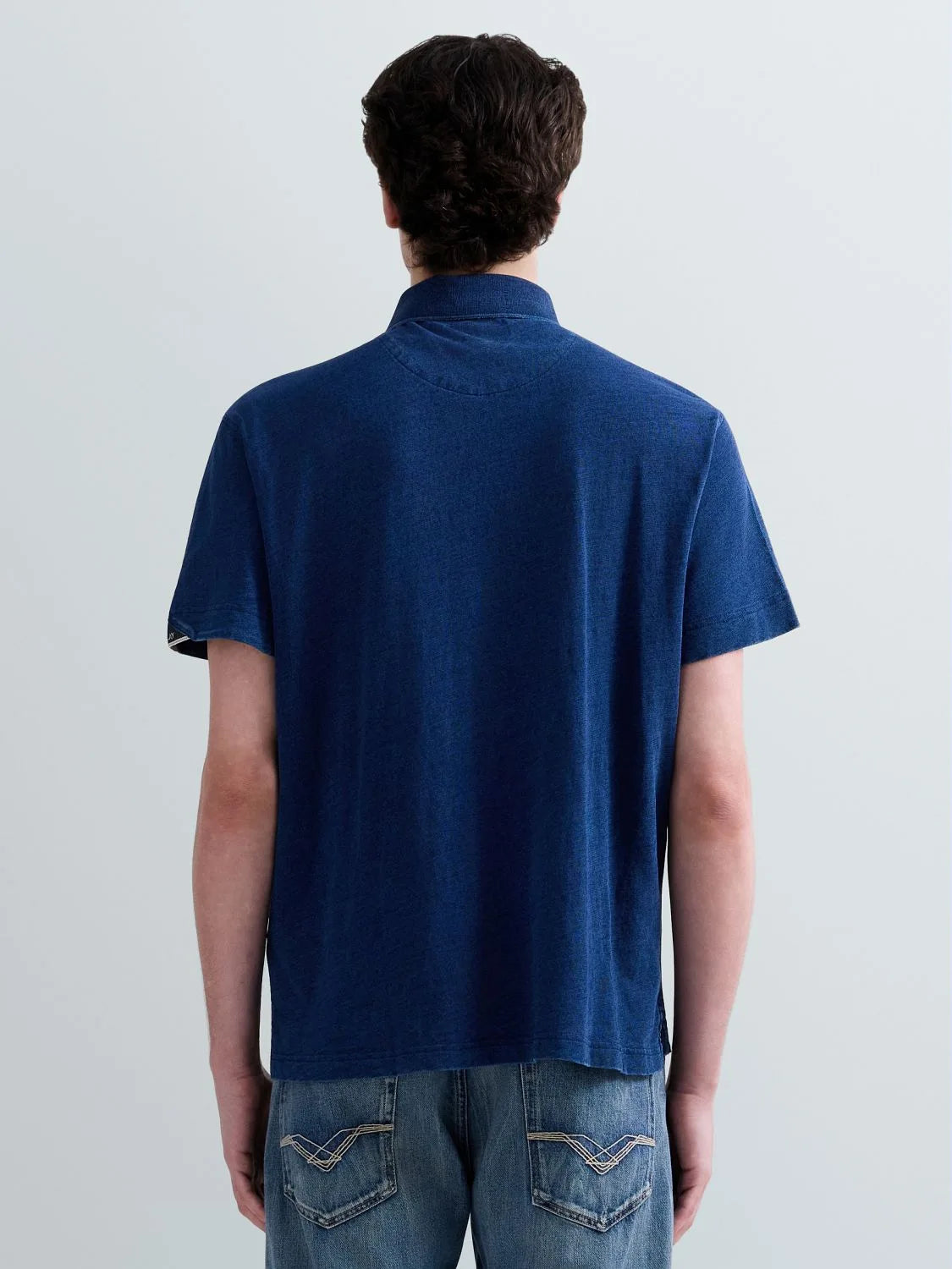 Polo de punto efecto denim